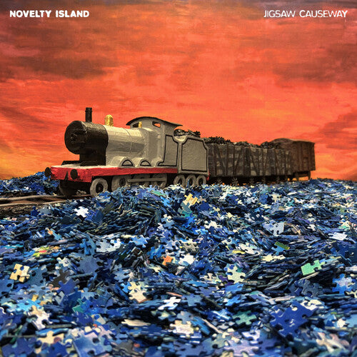 Novelty Island: Jigsaw Causeway - COMPACT DISCS