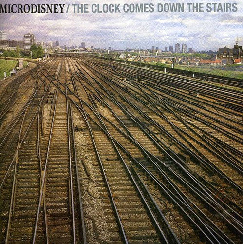 Microdisney: Clock Comes Down the Stairs